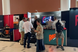 Razor team speaking with trailer industry visitors at the NATDA 2026 booth.